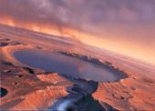 Artist rendering of water on a crater on mars.